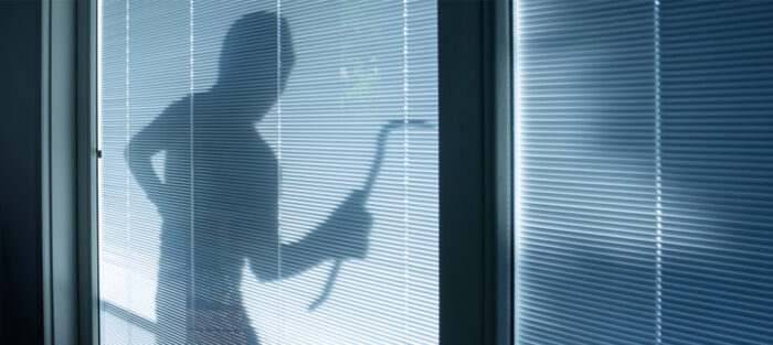 Safety: Photo where you see the shadow of to burglar in the window